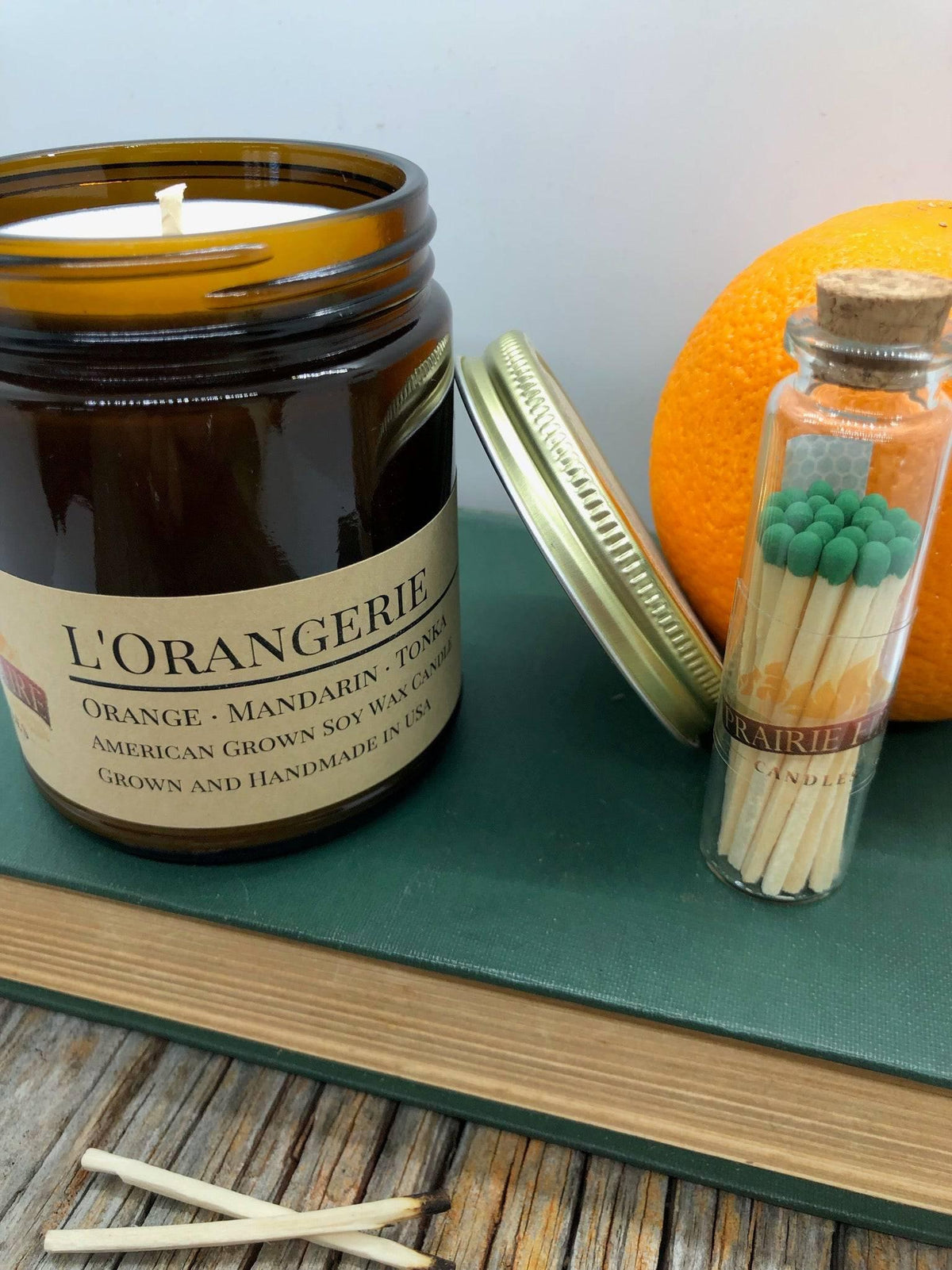 PRAIRIE FIRE L'Orangerie Soy Wax Candle | 9 oz Amber Apothecary Jar