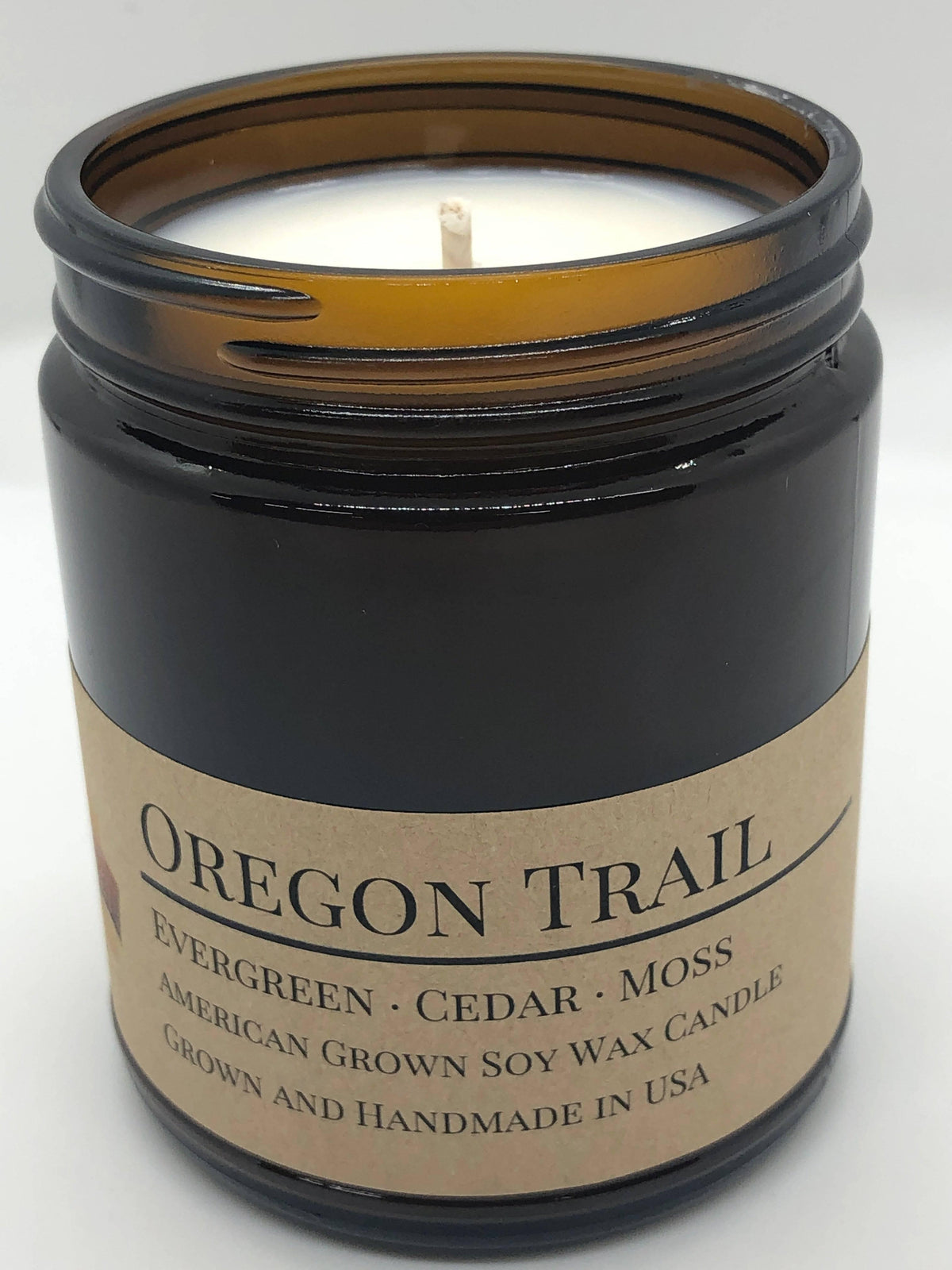 PRAIRIE FIRE Oregon Trail Soy Wax Candle | 9 oz Amber Apothecary Jar