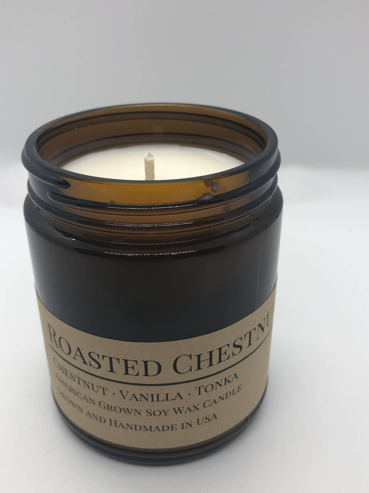 PRAIRIE FIRE Roasted Chestnut Soy Wax Candle | 9 oz Amber Apothecary Jar